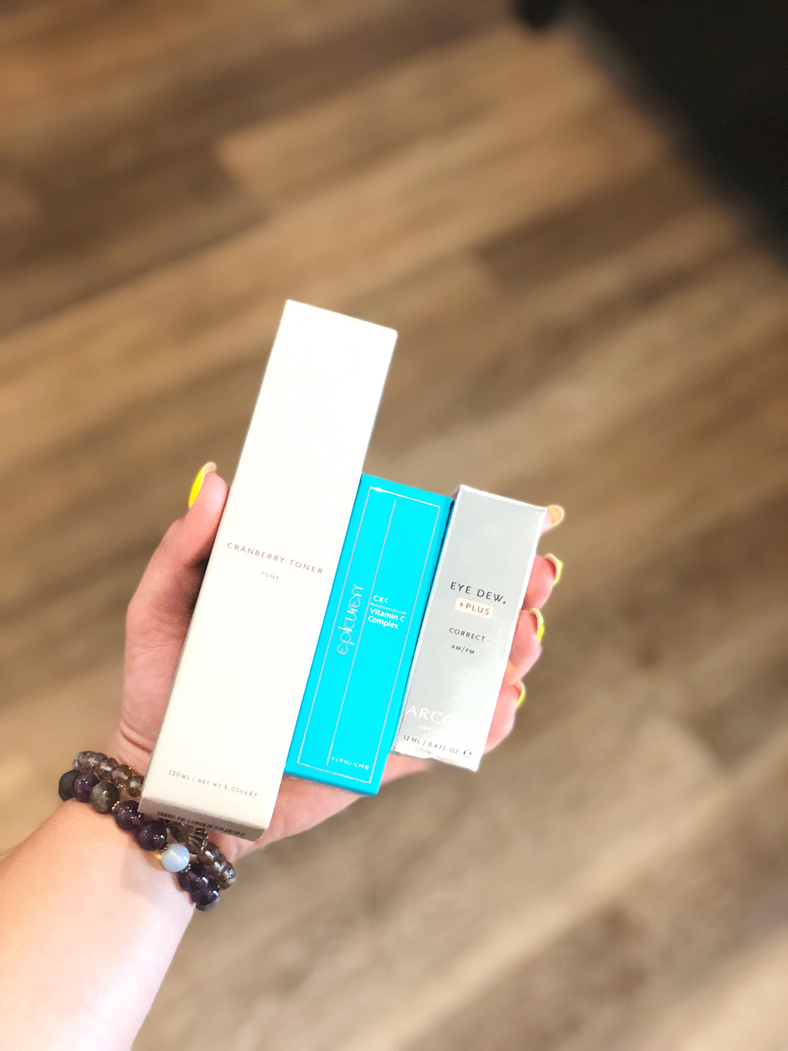 Picture of Arcona's Cranberry Toner, Epicuren's Vitamin C Complex, and Arcona's Eye Dew Plus.